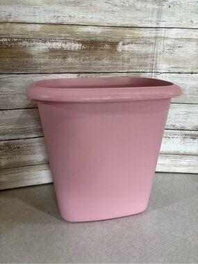 Vintage pink Rubbermaid garbage can